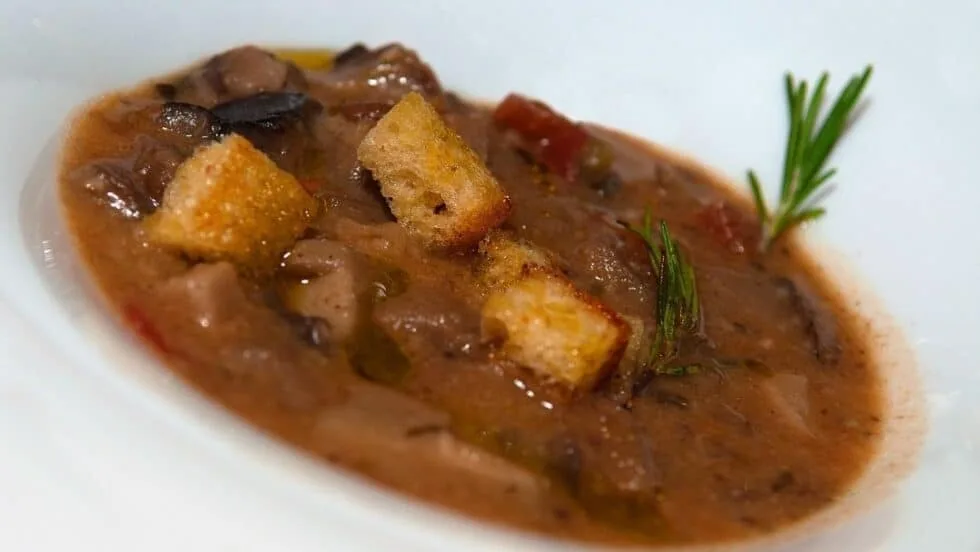 Savory 4-mushroom soup in a bowl, ready to serve